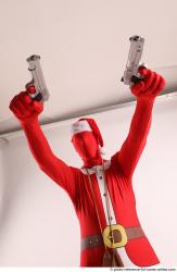 JOEL_ADAMSON CHRISTMAS VILLAIN WITH TWO GUNS